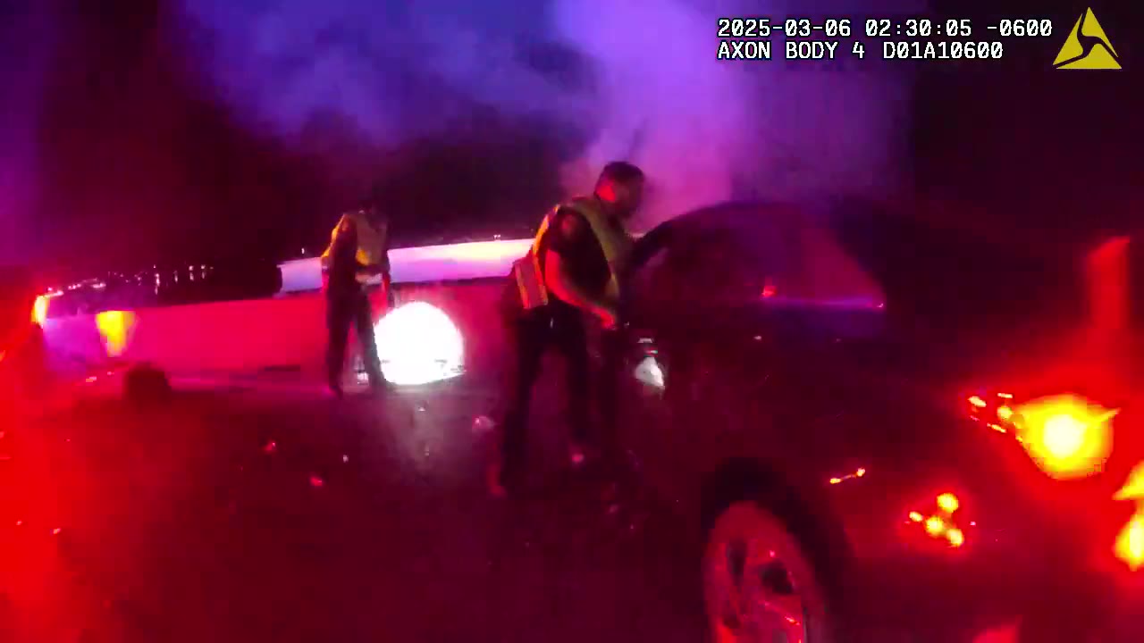 Rowlett officer pulls driver from burning car | RAW